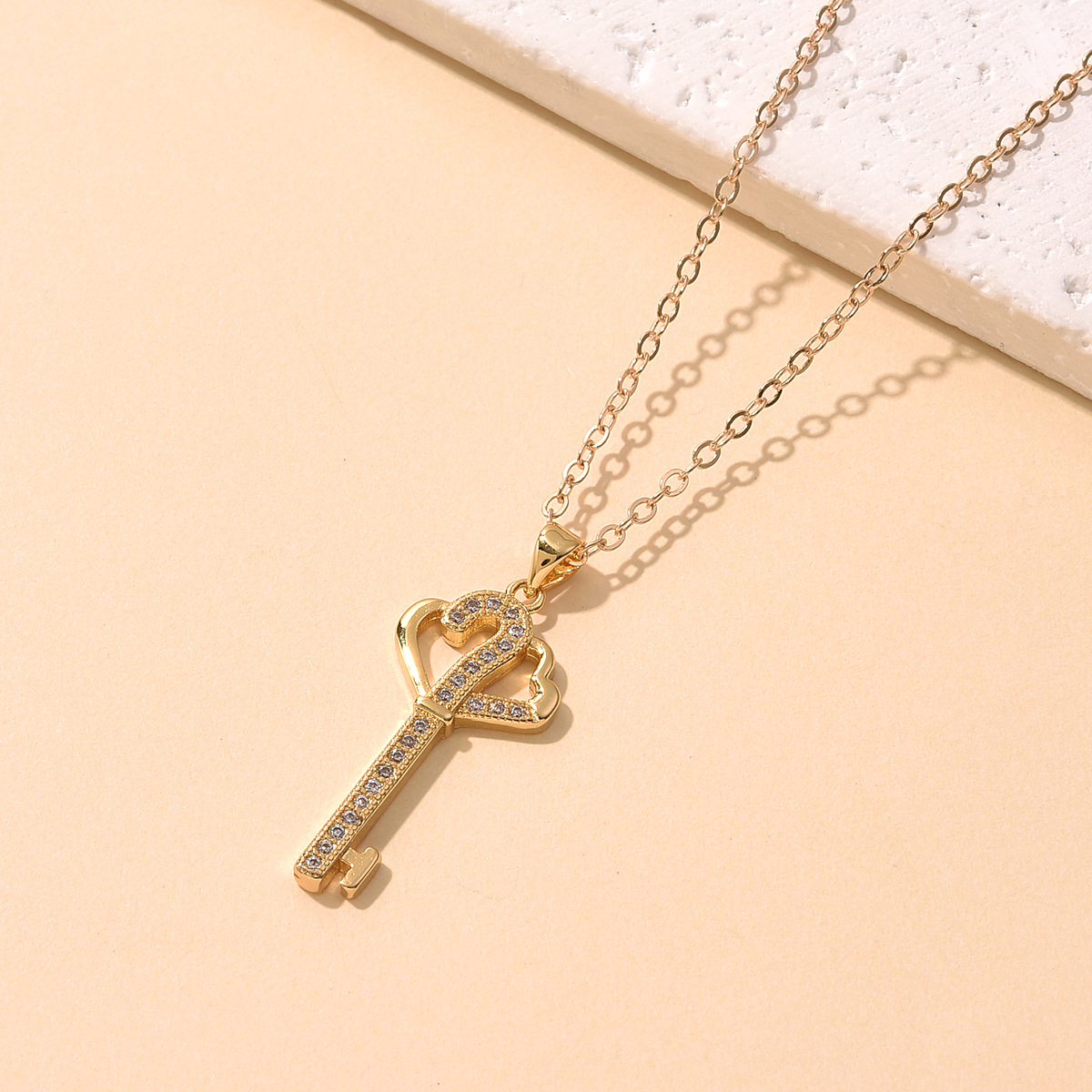 Key pendant necklace with simple and fashionable design, DIY micro-inlay, elegant and light luxury zircon accessory necklace pendant jewelry Application Scenario