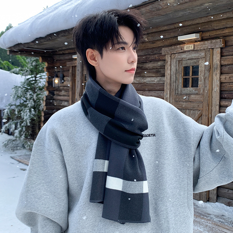 A men's scarf is a versatile choice for autumn and winter. It's made of wool for warmth. A men's checkered student scarf is a thick birthday gift for your boyfriend details Picture