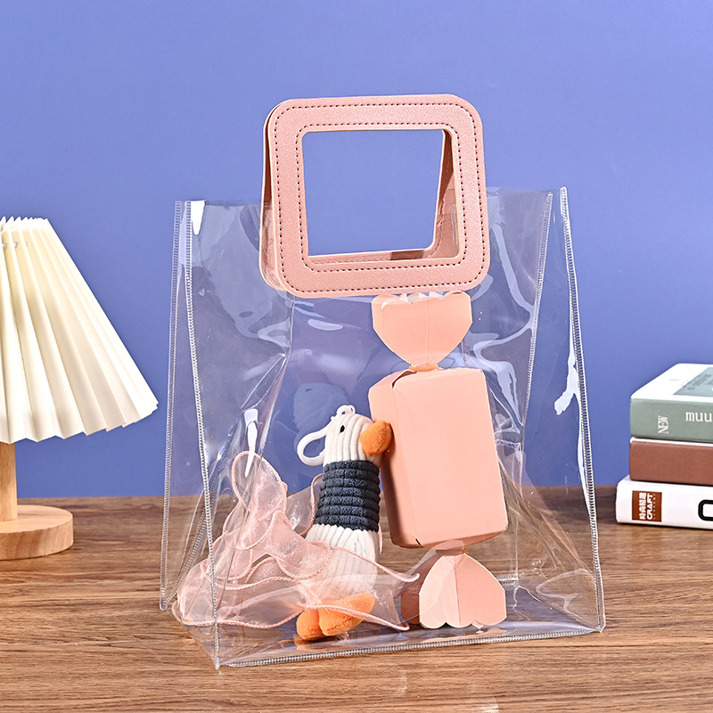 Custom-made pvc transparent handbags with a high-end feel, children's candy souvenirs, night market stall packaging gift bags Application Scenario