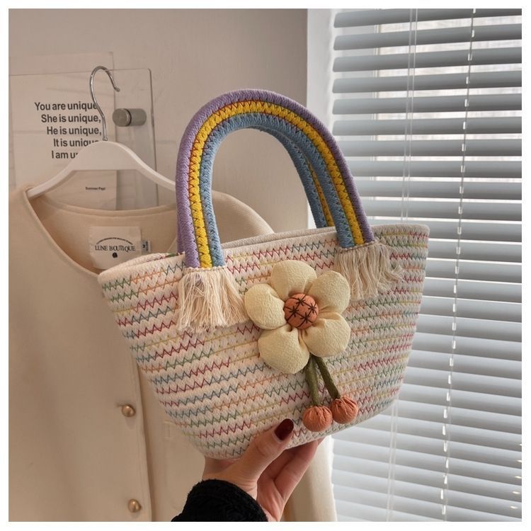 Korean-style trendy cotton rope handbag, a versatile and stylish handbag for Internet celebrities, a fresh and cute flower straw woven bag with a rainbow handle Application Scenario