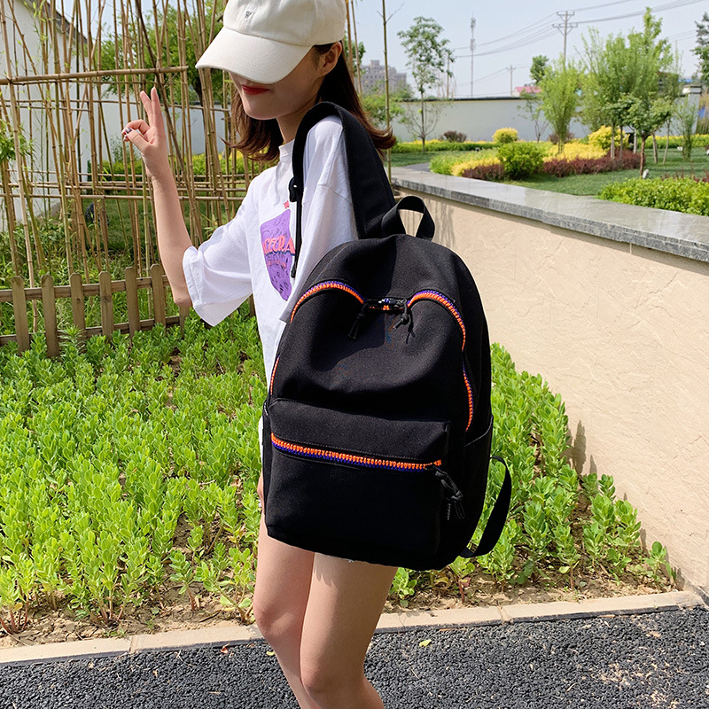 双肩包女新款潮流书包中学大学生休闲旅行中性引闪纯色牛津布背包详情4