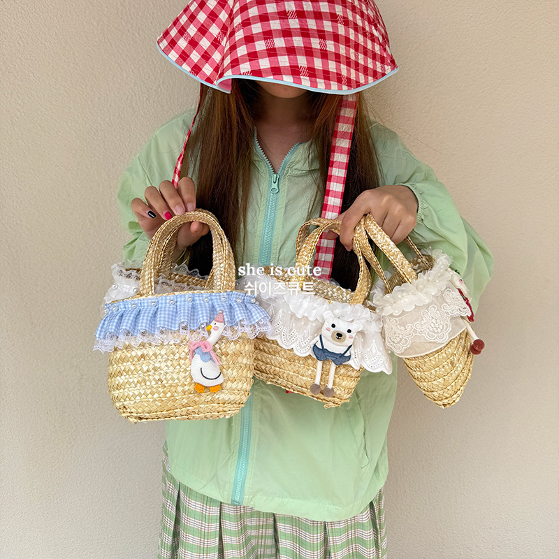 夏季原创草编包包女软萌卡哇伊水桶包轻便手提女包甜美挂饰手工篮