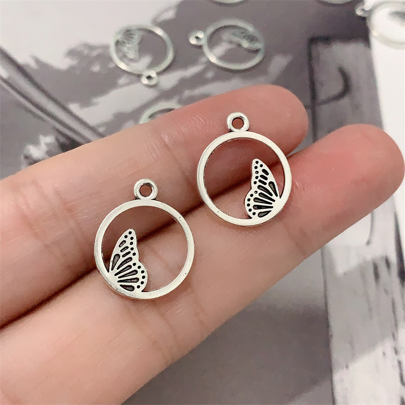 DIY zinc alloy jewelry accessories, hollowed-out circular butterfly pendants, earrings, necklaces, beaded bracelets, tassels, pendants Application Scenario