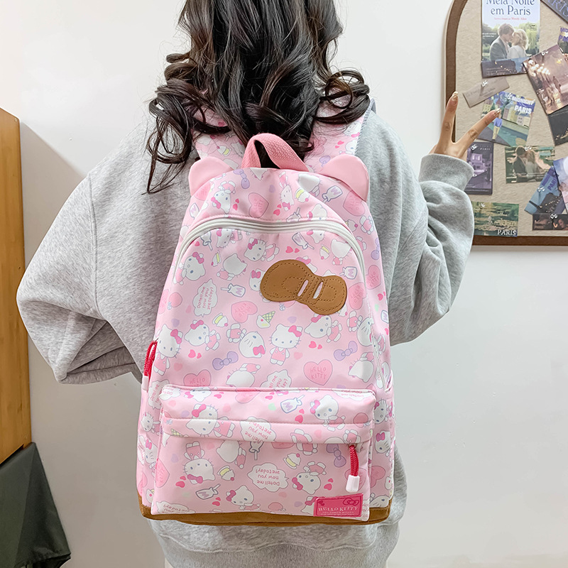 KT猫蝴蝶结书包高颜值双肩包女大学生高中初中可爱猫耳大容量背包