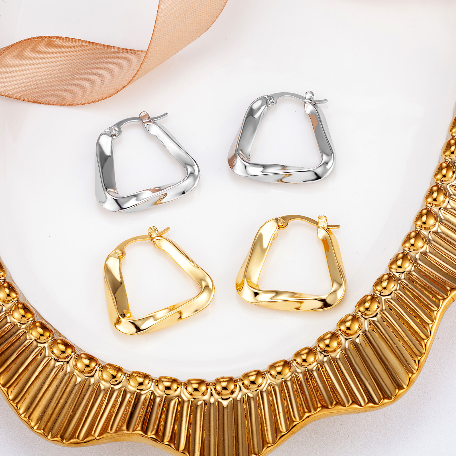 New French Retro Metal Geometric Twisted Triangular Buckle Female Cold Wind Small High-Grade Sense Ring Earrings Female