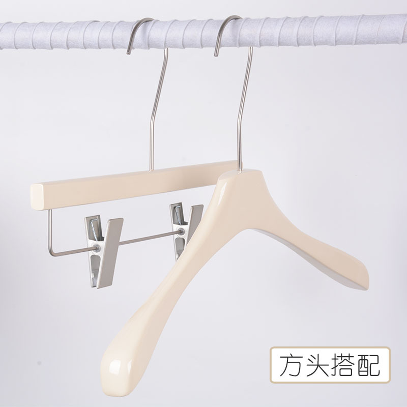 Wholesale of clothing store hangers for women's clothing, cream-colored solid wood hangers, Korean version anti-slip wooden clothes and trouser racks Application Scenario