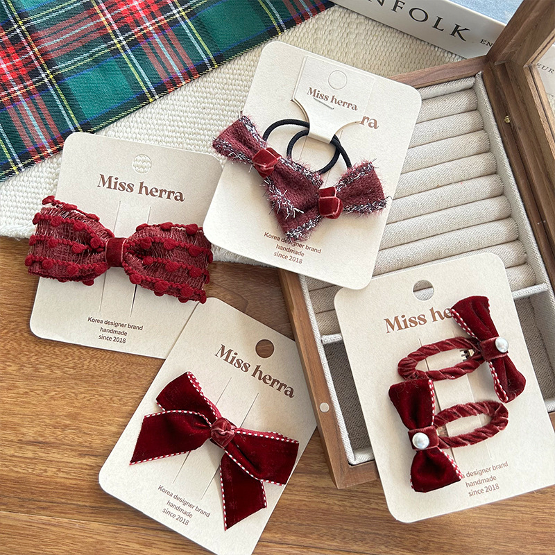 The new wine red girl's bow pearl fabric check pattern is versatile, sweet, and brings good luck for the New Year with bangs Specification image