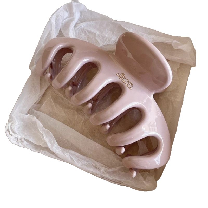 A simple and elegant polka dot clipper for women's large back head, a high-end shark clip, and a laid-back style hair clip headwear Item Picture