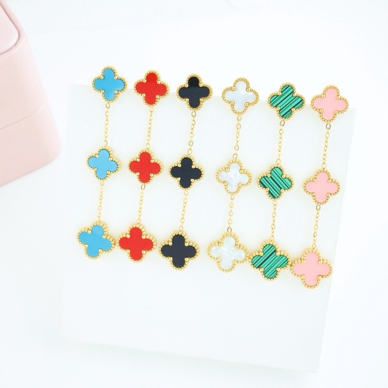 Moda encanto diseñador estilo de cuatro hojas pendientes largos titanio acero chapado 18K oro de alta calidad sentido transfronterizo auricular