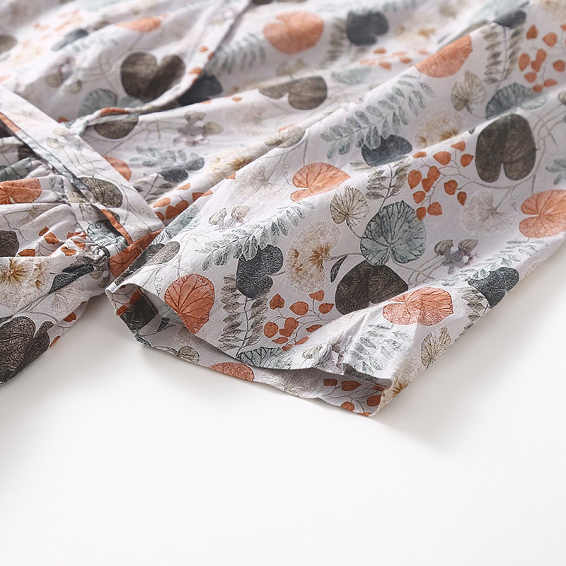 This is a retro forest-themed cotton and linen dress with small floral prints. It is a loose, large-sized, slimming V-neck, high-waisted, wide-swing long dress for women in summer Application Scenario