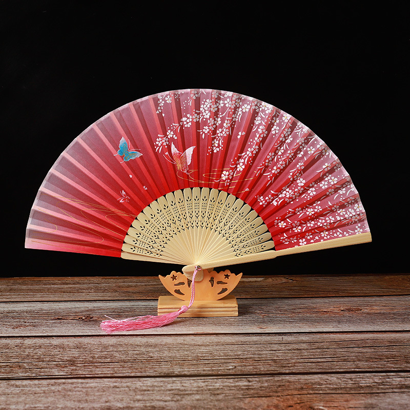 The manufacturer's bamboo folding fan, a smile fan for children, ancient-style fan, dance fan, folding fan, student gift, elegant fan details Picture