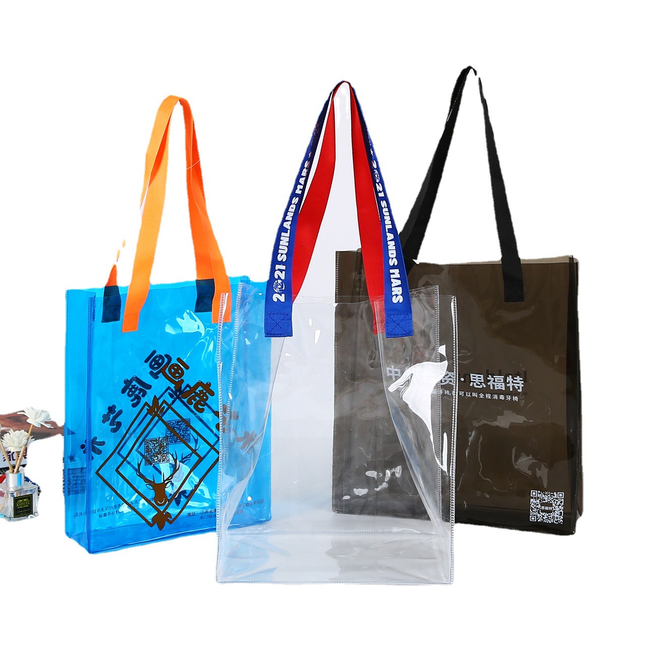 PVC手提袋镭射幻彩手提袋伴手礼包装礼品袋透明塑料果冻化妆包详情图5