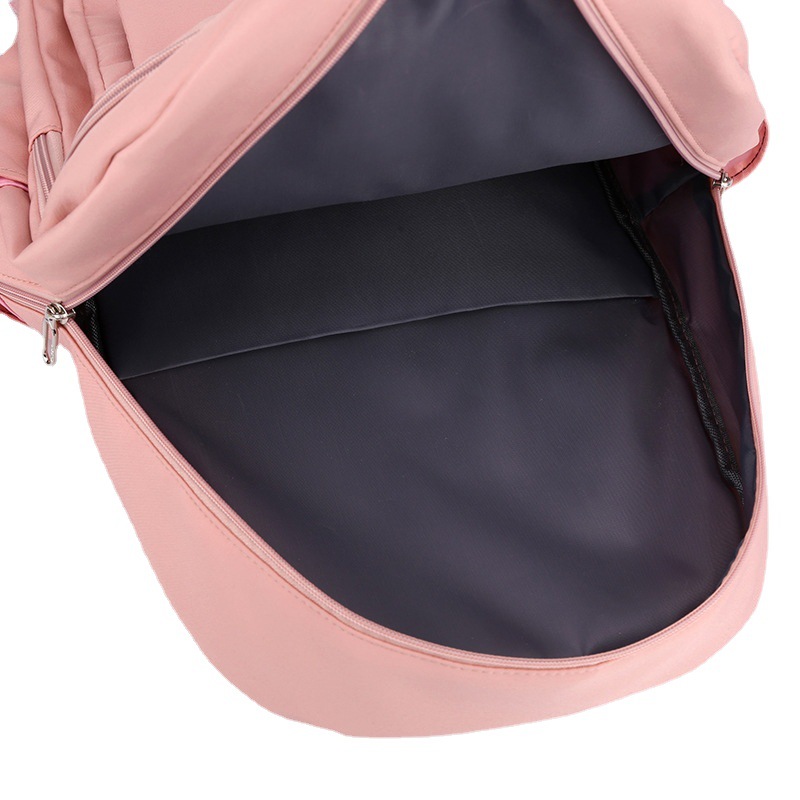 Cross-border wholesale of new school bags for primary and secondary school students, large-capacity, lighter-load casual backpacks, fashionable travel computer backpacks Item Picture