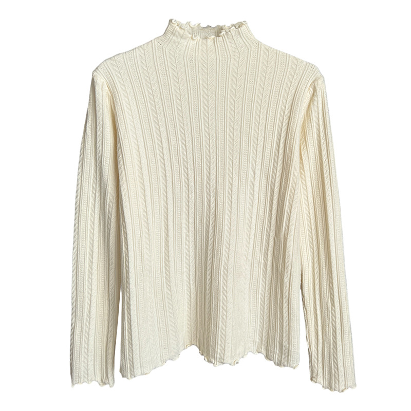 A high-end white base layer for women in the 2024 autumn and winter collection, paired with a semi-high-neck sweater and a black ear-trimmed knitted top Item Picture