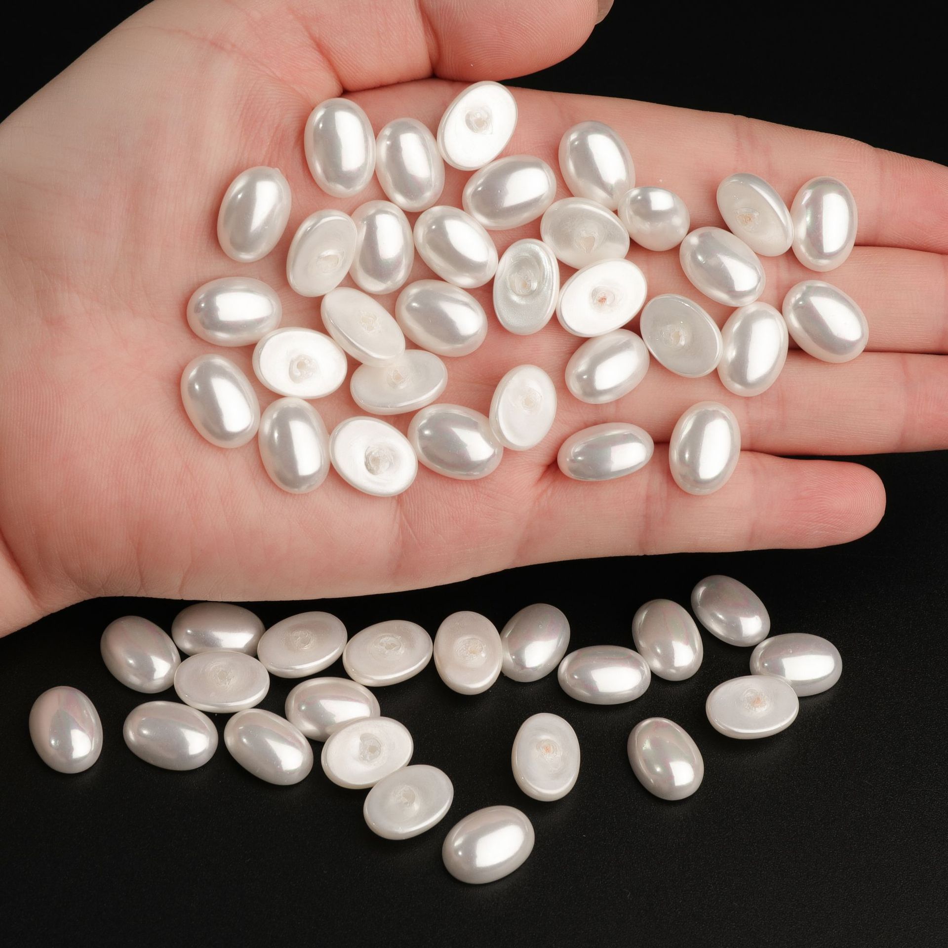 Factory direct supply of large quantities of shell pearls, oval half-sided shell pearls, DIY jewelry, button accessories, loose beads wholesale