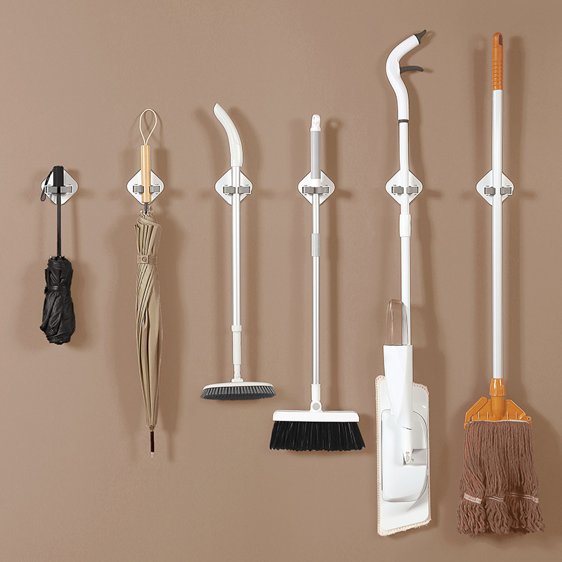 Hole-free mop clip, household nail-free bathroom hook, wall-mounted multi-functional wall broom, mop hanger Application Scenario