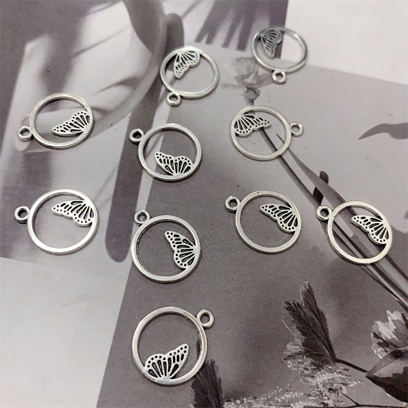 DIY zinc alloy jewelry accessories, hollowed-out circular butterfly pendants, earrings, necklaces, beaded bracelets, tassels, pendants Specification image