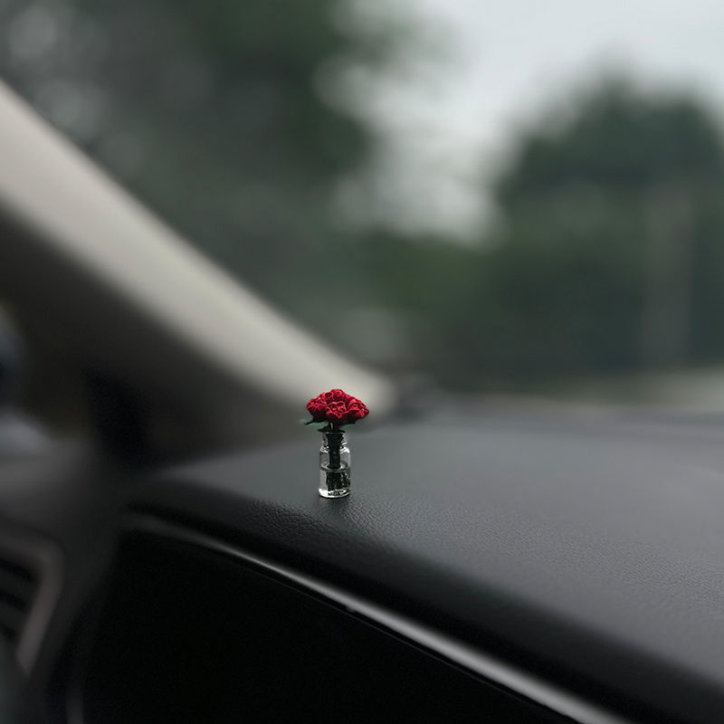 The charming rose-shaped car center console window decoration is a mini car accessory, making it unique and beautiful for ladies inside the car