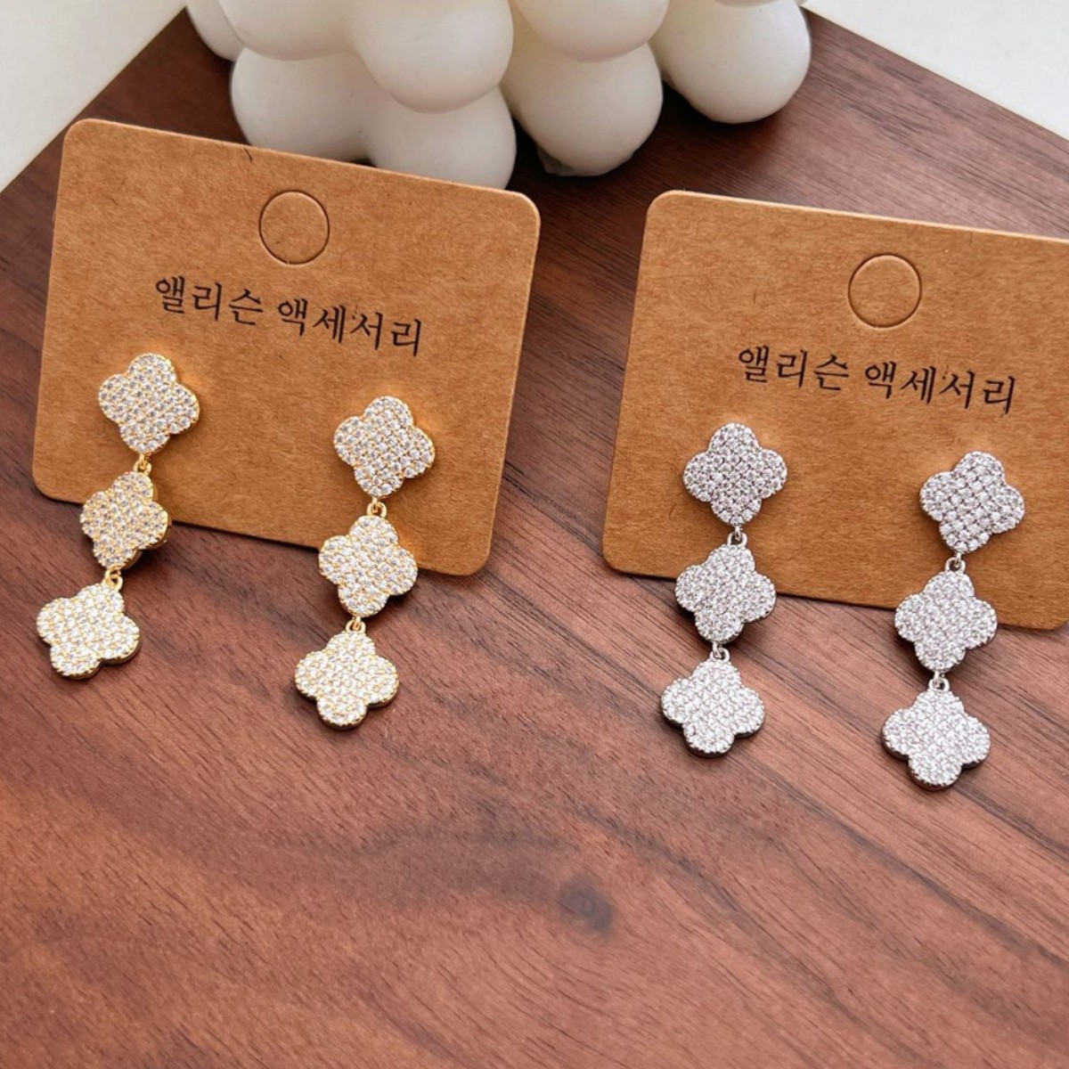 Spring's new four-leaf clover earrings, slightly inlaid zircon high-end tassel earrings, are fashionable, versatile and simple accessories