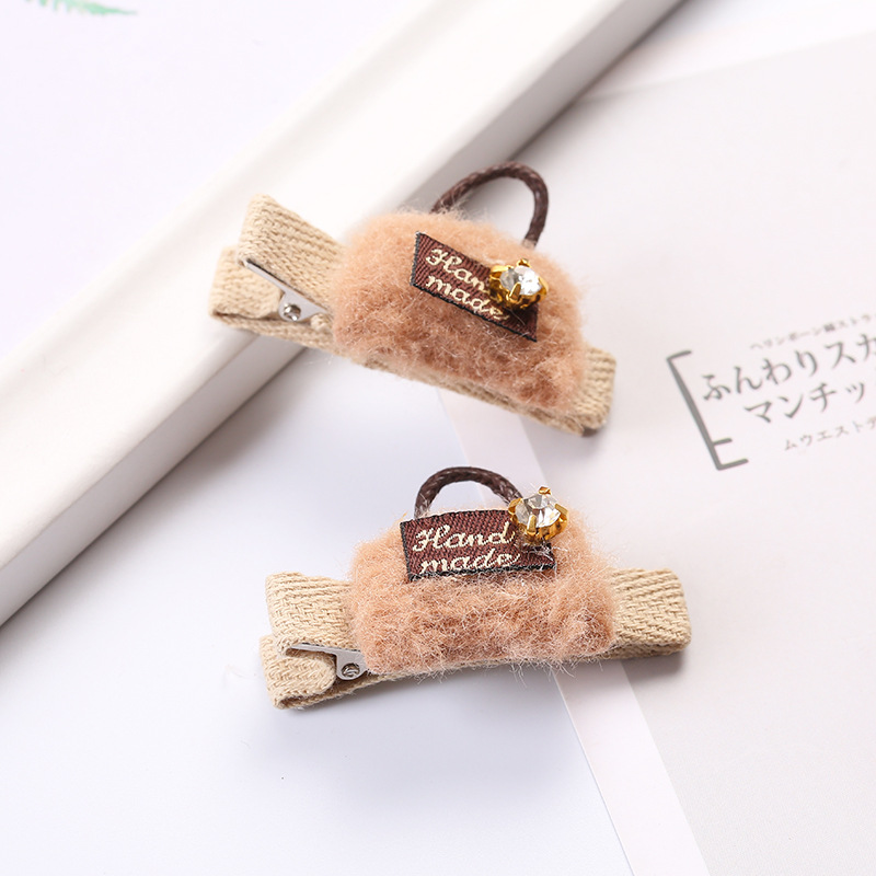 Versión coreana para niños tendencia tela peluche bolsa de regalo tarjeta de pelo duckbill clip chica franja clip chica headwear precio de fábrica al por mayor Specification image