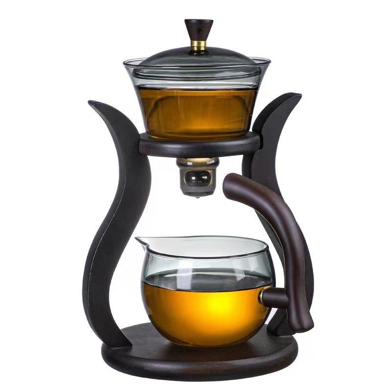 Kung Fu tea set, fully automatic glass tea cup set, transparent tea brewer, heat-resistant lazy person's teapot, home creative gift Application Scenario