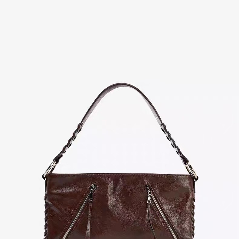 Z家厂家直销秋季新品复古大容量手提包铆钉穿绳手腕包旅行单肩包