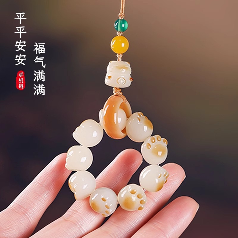 Factory direct sale of natural Bodhi root design mobile phone chain, finely crafted charcoal-burned kitten paw mobile phone chain accessory pendant Application Scenario