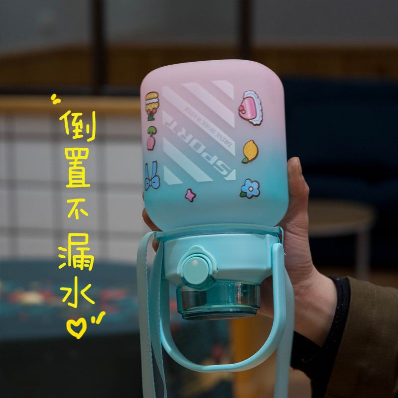 Cross-border Internet celebrity plastic large-bellied cup, large-capacity straw, bouncy handle, shoulder strap, portable creative cube sugar cartoon water cup Application Scenario