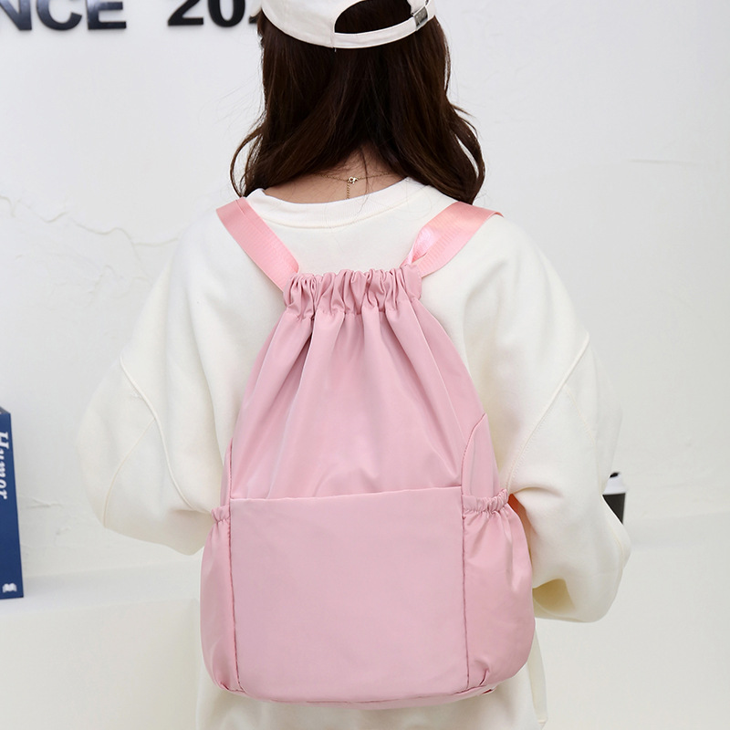 Cross-Border Drawstring Backpack Bundle Mouth New Nylon Waterproof Thickened Sports Bag Large Capacity Outdoor Travel Backpack Application Scenario
