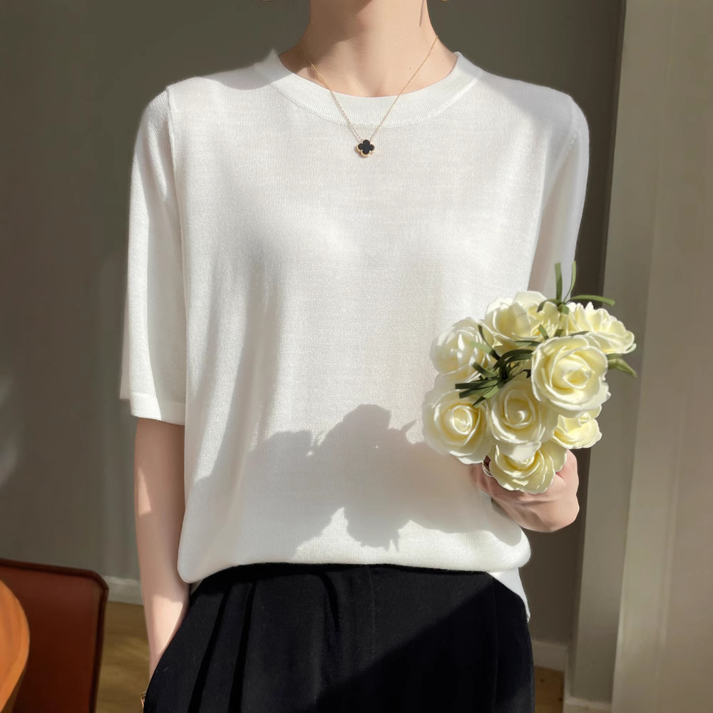 Wear a macaron-colored Tencel wool short-sleeved shirt inside with a half-sleeved solid-colored, fashionable, loose round-neck knitted T-shirt for women details Picture