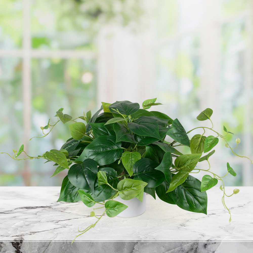 Amazon's best-selling 2-piece set of vertical plastic potted plants for home decoration, featuring simulated green plants such as pothos and apple leaf bonsai details Picture