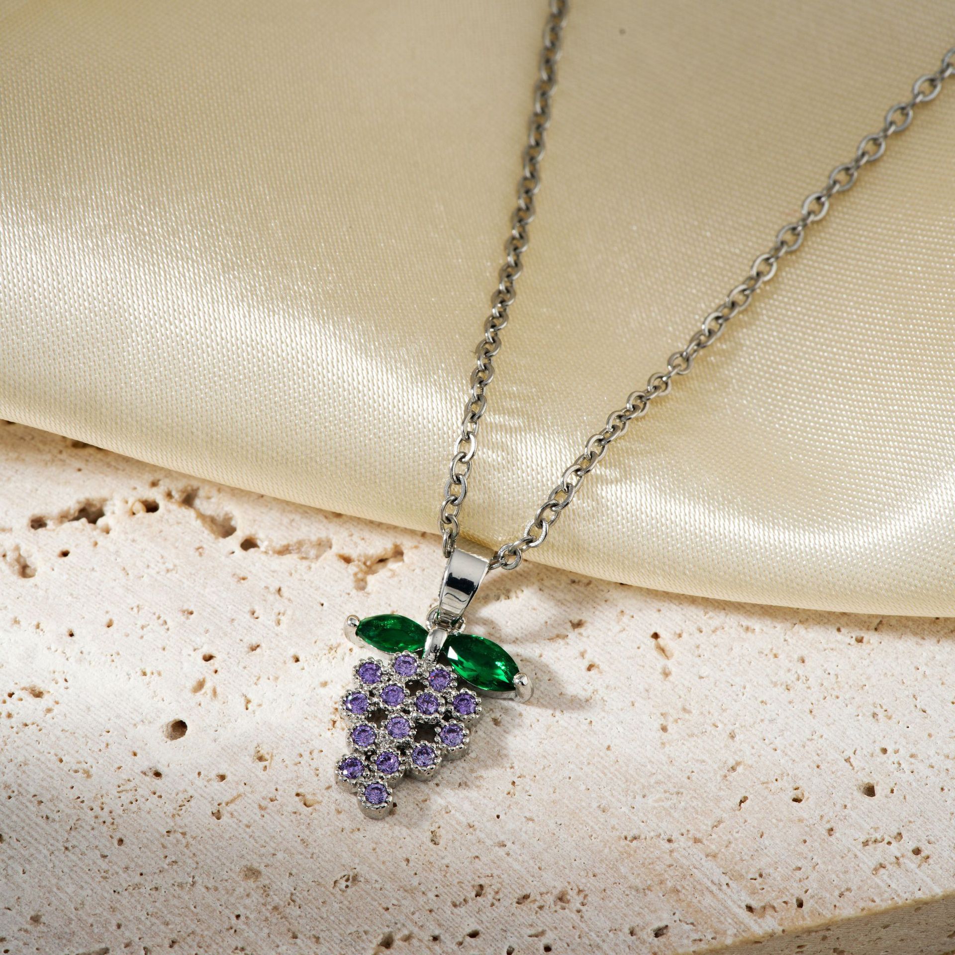 The new 2024 exquisite and fashionable copper-inlaid zircon grape pendant from Kashi is a sweet and popular stainless steel necklace accessory details Picture