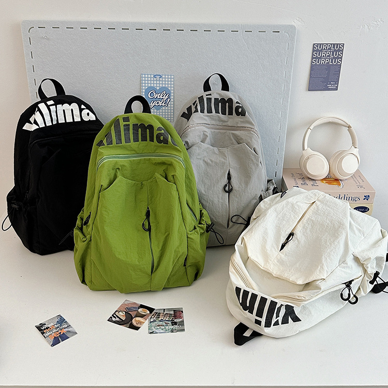 书包ins小众轻便防泼水高中生男女大容量运动户外双肩包旅行背包