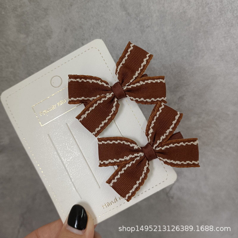 Korean-style simple and elegant children's and girls' hair clips, coffee-colored fringed ribbed bow double clips, bangs clips, side clips details Picture
