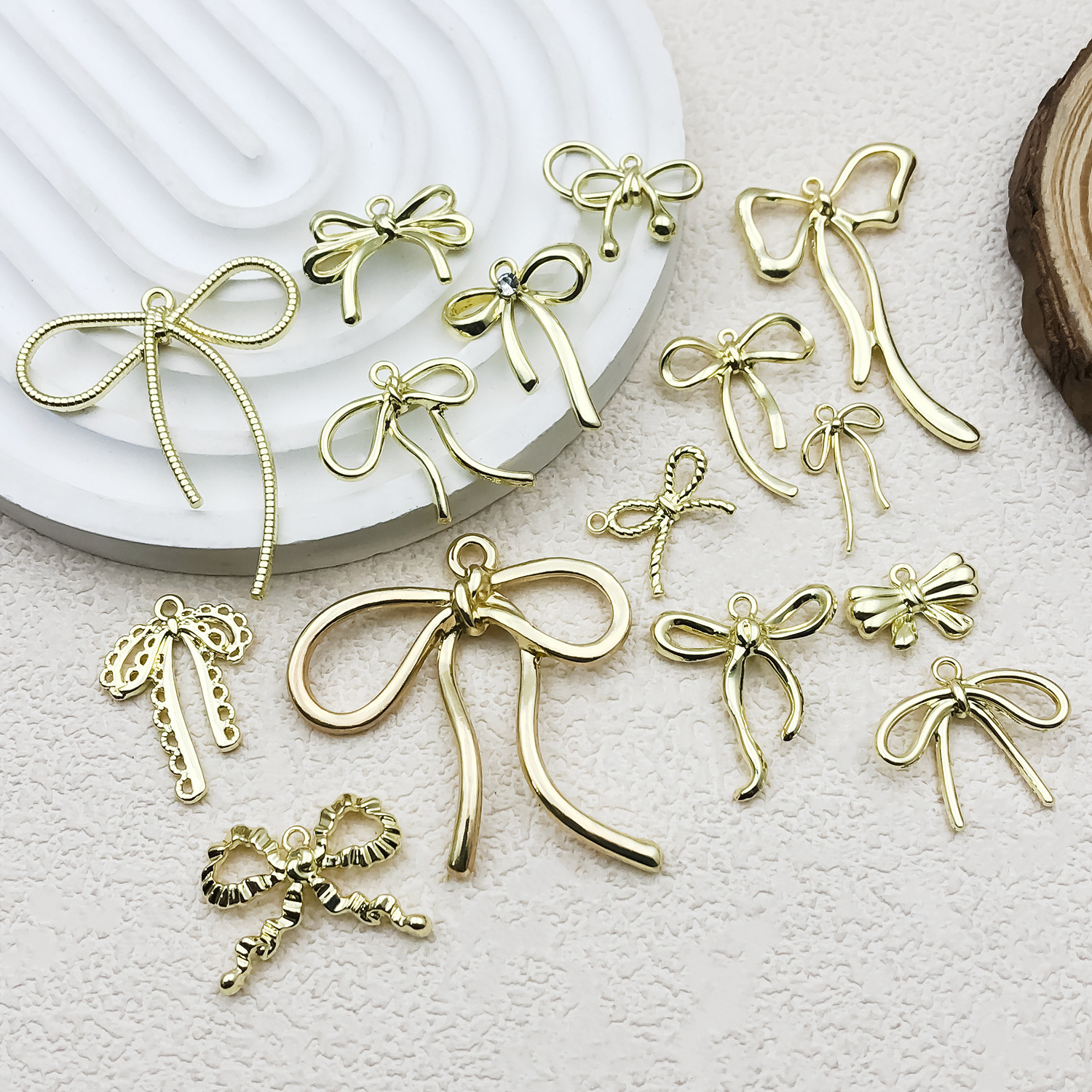 KC Gold color-preserving bow earrings, pendants, diy alloy jewelry accessories, clothing, bags and pendants are selling well across borders details Picture