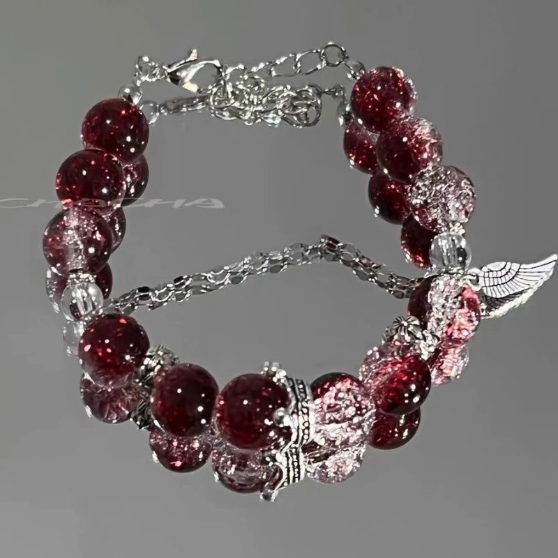 The four-piece bell-shaped butterfly bracelet with a crimson dream and a dark red crown exudes a unique and elegant charm. The deep red color scheme makes the skin look fair Application Scenario