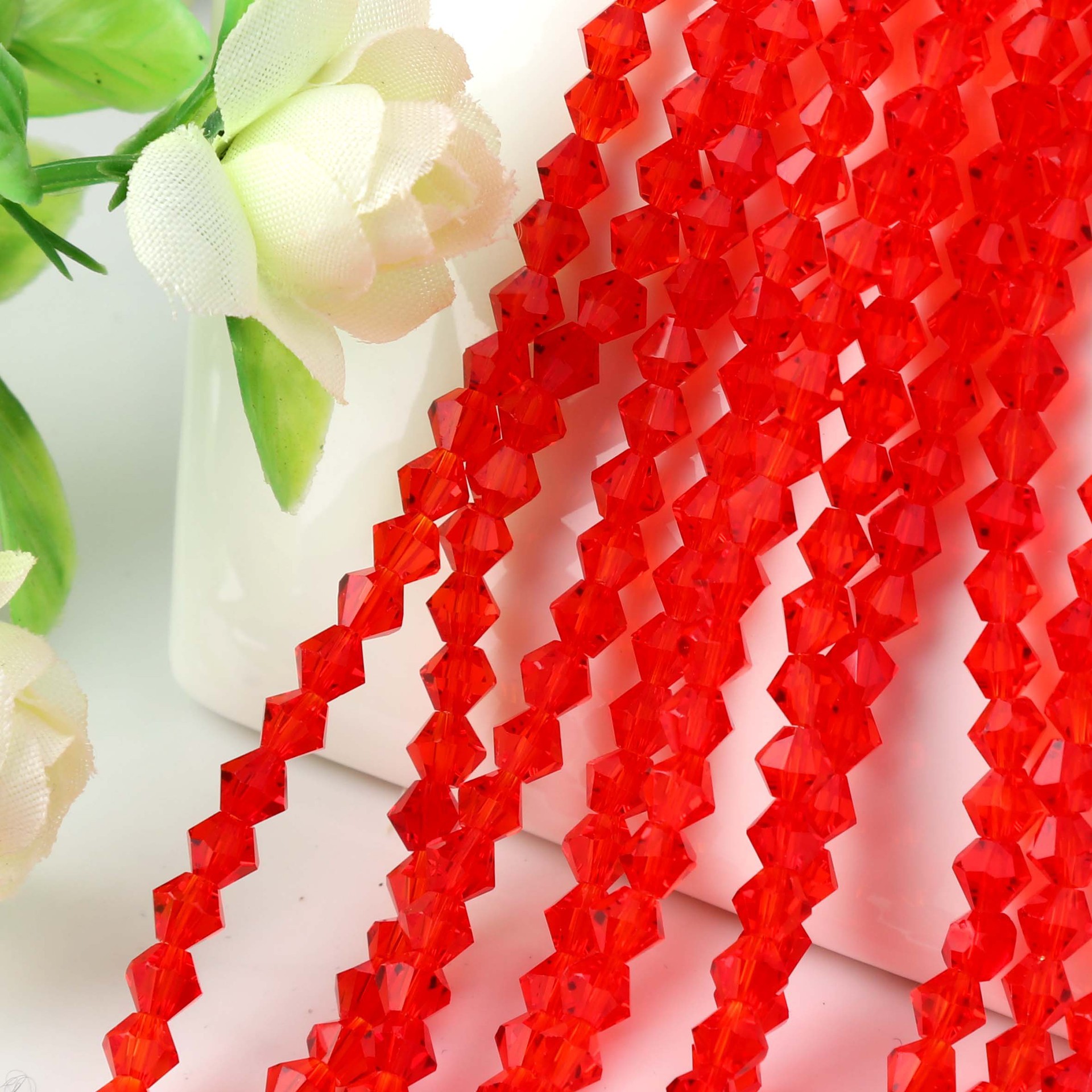 Diamond-shaped crystal loose beads 4mm/6mm hollow two-pointed DIY handmade hair accessory material, decorative accessories Application Scenario