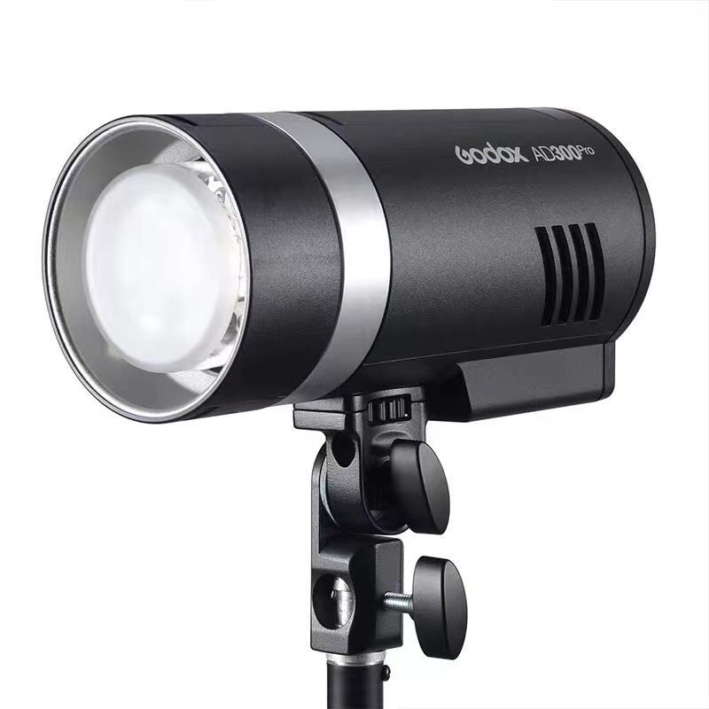 The Shenniu AD300Pro external shooting flash is a portable outdoor portrait studio lighting high-speed TTL synchronous photography light