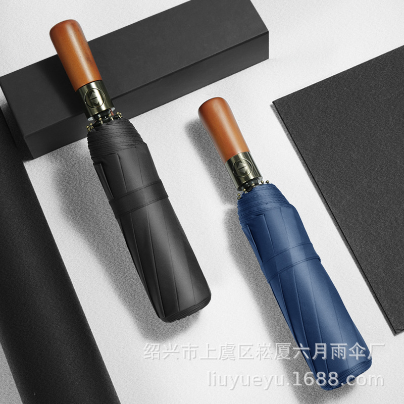 Solid wood handle three-fold fully automatic all-weather umbrella, black rubber folding, logo printing advertising umbrella, extra-large size details Picture