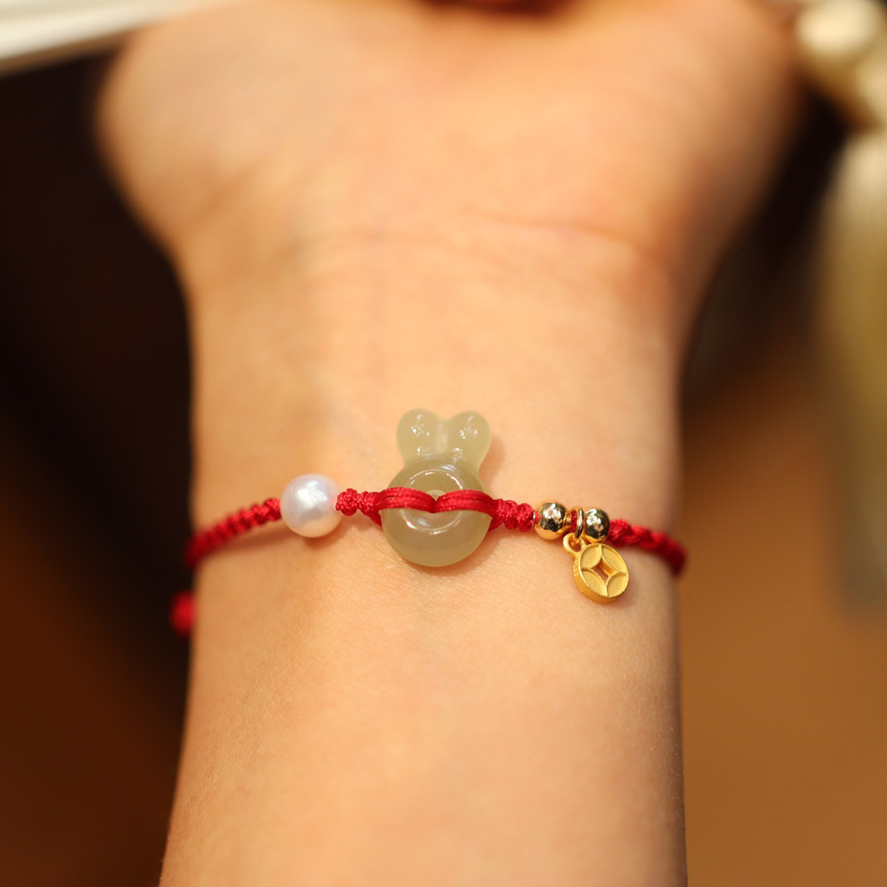 Natural Hetian Jade Rabbit bracelet for women, new Chinese-style red rope woven bracelet, retro zodiac year bracelet, a gift for girls Item Picture