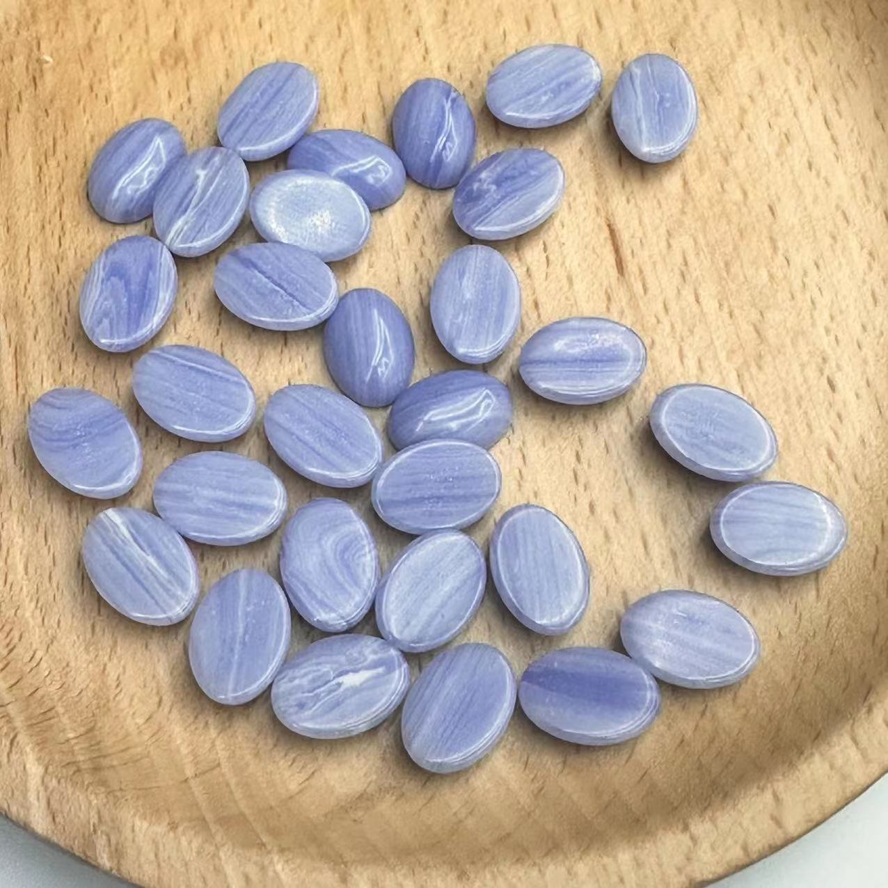 The manufacturer is selling a new type of synthetic purple agate Songdan shaped ring face, European and American fashionable crystal bare stone accessories wholesale loose beads Specification image