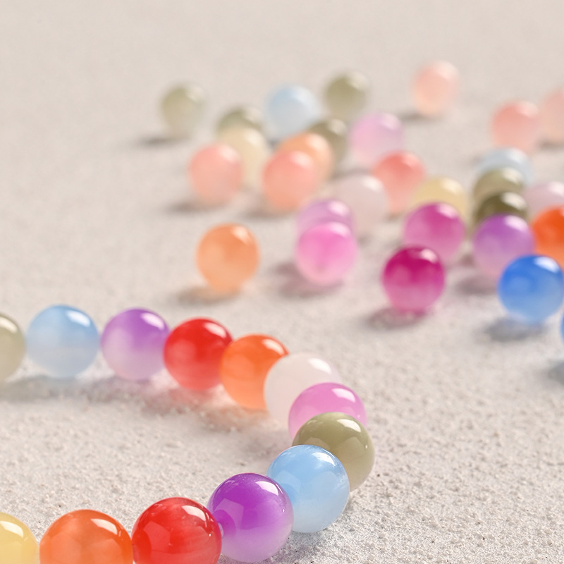 Premium instant color-changing seven-color mica tulip light-changing pure white cat's eye resin bead stringing material DIY accessories Application Scenario