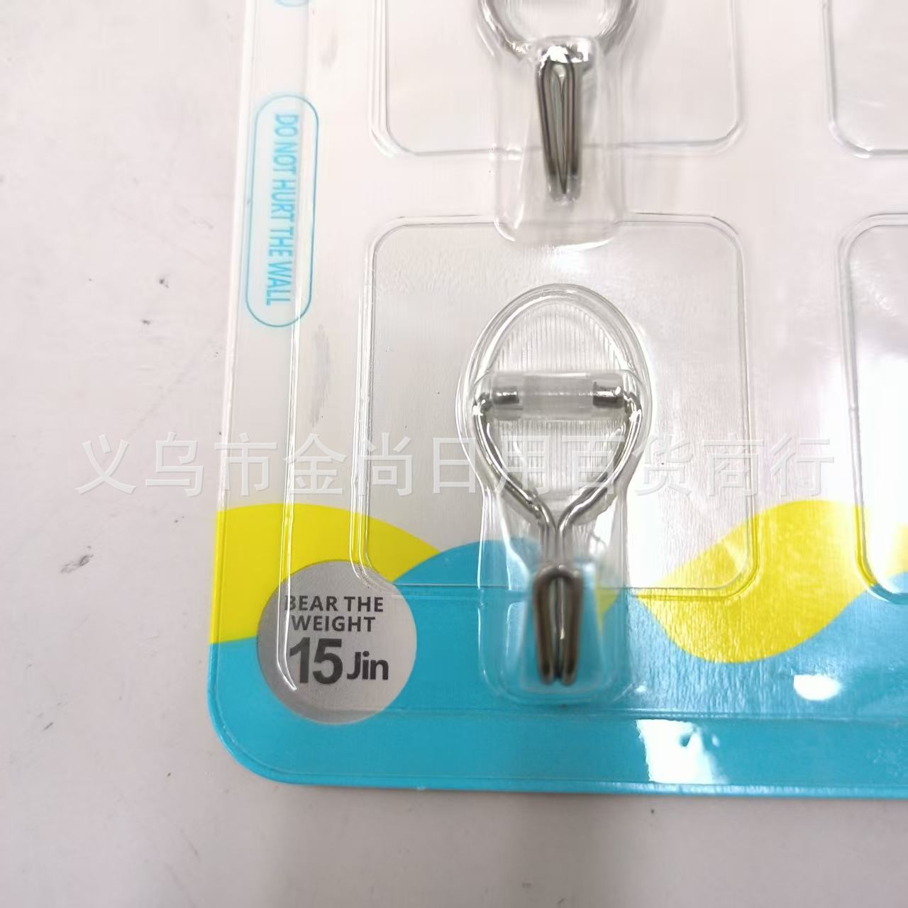 Transparent golden adhesive hook, household seamless adhesive hook, can be hung behind the dormitory door without nailing or damaging the wall Application Scenario