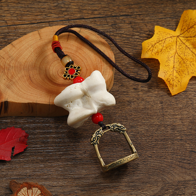 藏式纯骨头嘎/顺利饰品商行/汽车挂件红旗产品图