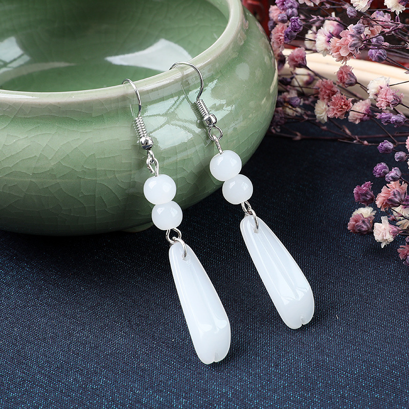 Ancient-style white jade earrings, a retro accessory for Hanfu. Petal jade bead ear hooks pendant, a classical and elegant original stone earrings