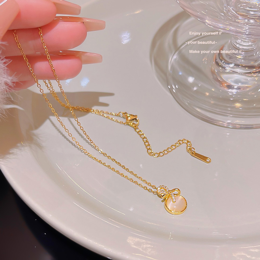 Korean Web Red Bow Necklace Titanium Steel Simple Personality Design Sense Cat's Eye Collarbone Chain Hot Accessories Wholesale details Picture
