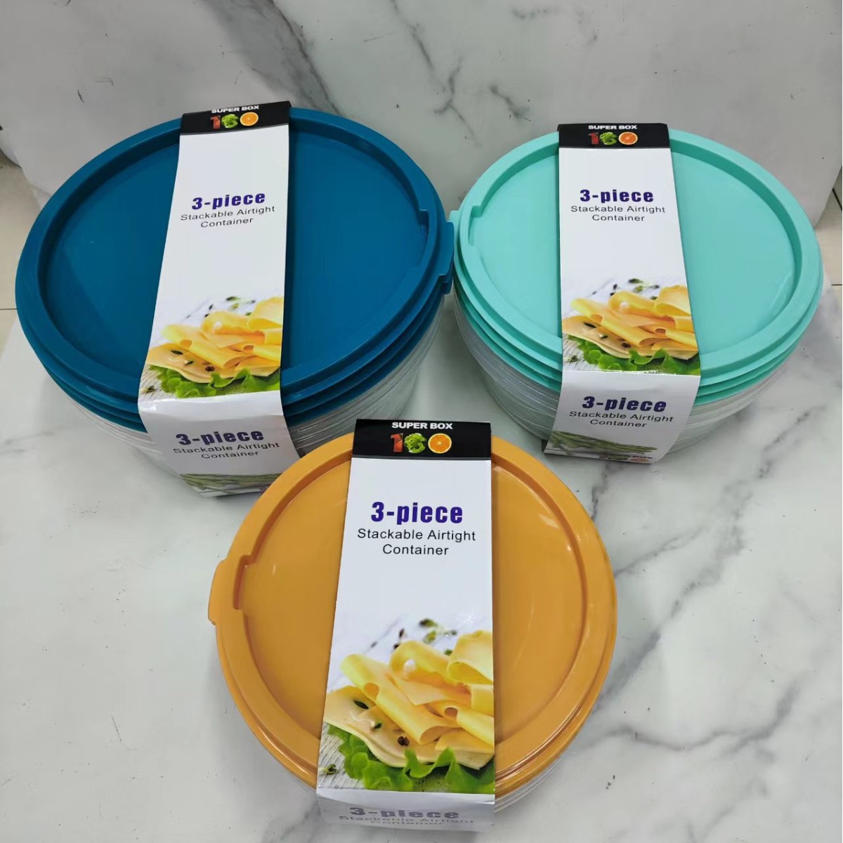 New round plastic storage box with lid, refrigerator fruit and vegetable storage box, and household transparent bento box set full figure
