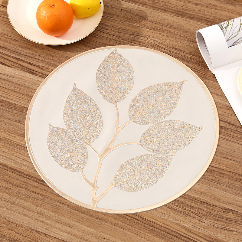 Amazon European-style round PVC placemats, creative leaf light luxury restaurant heat insulation pads, heat-resistant high-end Western placemats Item Picture