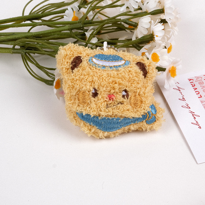 Squeaky's new cartoon Butter Bear plush doll cute girly heart bag doll brooch hanging accessory Specification drawing