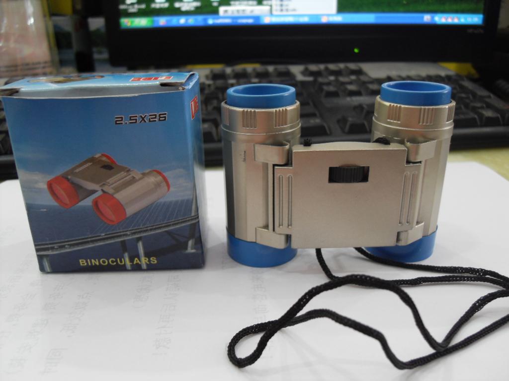 Wholesale toy binoculars are compact and portable, with a large panel space for printing logos